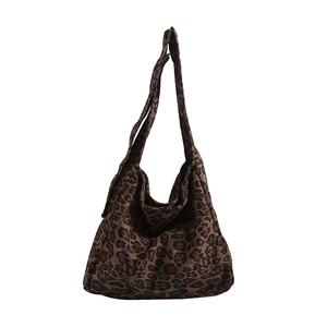 Chic leopard print cotton canvas hobo shoulder bag with a wide strap design