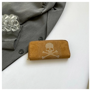 Tan faux suede long wallet with rhinestone skull design and golden zipper closure