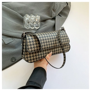 Classic houndstooth PU leather underarm bag with sleek shoulder strap and flap closure