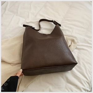 Fashionable dark brown PU leather tote bag with vintage pleated texture and shoulder strap