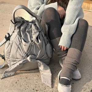 Grey nylon cloud backpack with bow ribbons and small coin purse in urban style