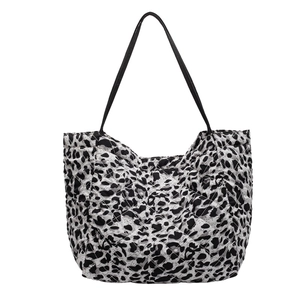 Chic black and white leopard print quilted tote bag with large capacity for women