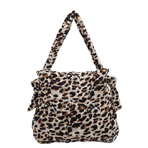 Chic quilted leopard print tote bag with stylish bow knots and spacious interior design