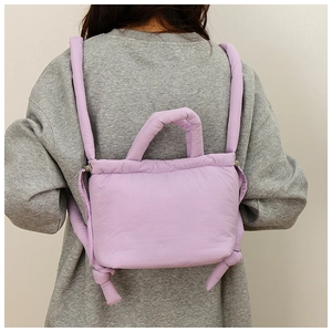 Quilted lavender nylon backpack with soft padded straps and top handle for women