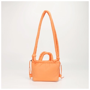 Chic orange quilted nylon puffer bag with padded handles and adjustable shoulder strap
