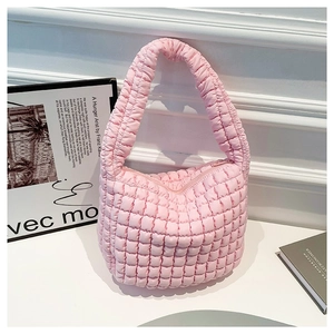 Pink quilted puffer hobo bag in soft fabric for women featuring a minimalist half-moon design