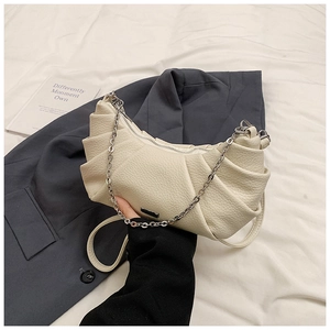 Minimalist creamy white crescent moon bag with silver chain and litchi grain texture