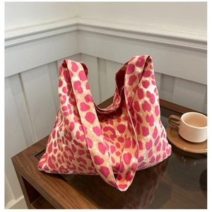 Sac fourre-tout tendance en toile à imprimé léopard rose et orange pour un usage quotidien