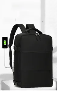 Detail of expandable black business backpack showing 23L to 41L capacity increase