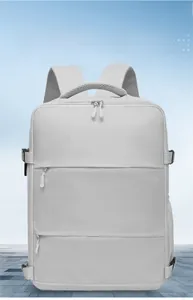 Macro view of light grey waterproof fabric and breathable mesh straps on travel backpack