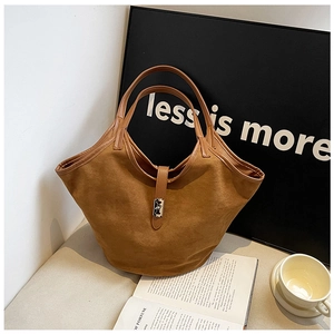 Deep brown suede bucket bag with stylish silver metal buckle and double leather handles