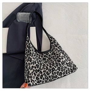 Fashionable leopard print crescent shoulder bag for women with black leather strap