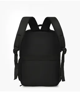 Detail of ergonomic breathable mesh straps and luggage strap on black business backpack