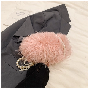 Pink faux fur plush shoulder bag with pearl handle and chain strap for women