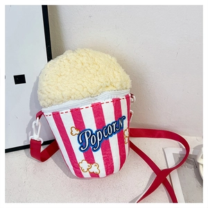 Furry popcorn shaped crossbody bag with pink white stripes and lamb wool top design