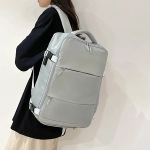 Large capacity minimalist light gray travel backpack with waterproof fabric and multi-pockets