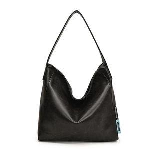 Minimalist black PU leather tote bag with stylish shoulder strap and matte finish