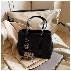 Chic black tweed and leather shoulder tote bag for women with leopard print charm