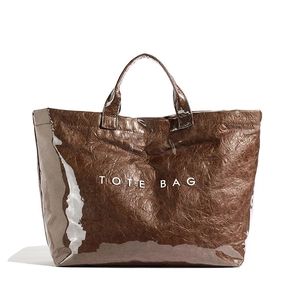 Brown vintage crinkle Dupont paper tote bag with white TOTE BAG print for daily commute