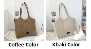 Detail of heart quilted tote bags in coffee and khaki with soft textured composite fabric