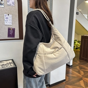 Quilted beige large capacity dumpling crossbody bag for women with wide shoulder strap