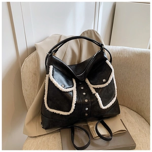 Chic black PU leather tote with white faux fur trim and front double pockets for women