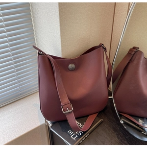 Chic burgundy PU leather hobo shoulder bag with silver buckle and adjustable wide strap