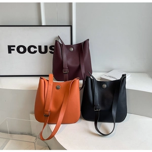 Minimalist PU leather bucket shoulder bag in burgundy, orange and black colors