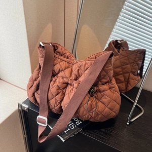 Brown quilted nylon crossbody shoulder bag with stylish diamond stitching for women
