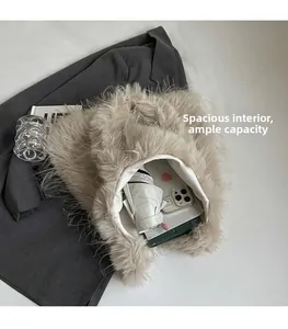 Interior view of beige faux fur tote bag showing large capacity for umbrella and phone