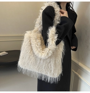Detail of soft cream faux fur tote bag showing the fluffy texture and large capacity