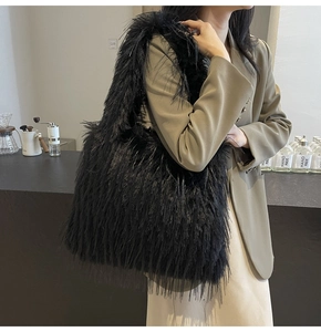 Chic black faux fur tote bag with long plush texture and large capacity shoulder strap