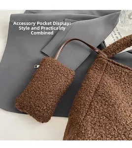 Detail of a brown teddy fleece tote bag with a matching zippered small pouch attachment