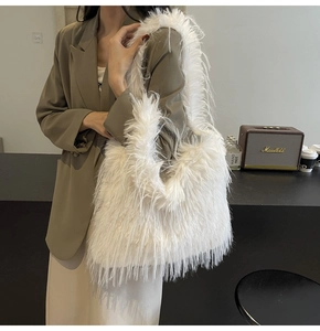 Close-up of white faux fur shoulder tote bag showing soft plush texture and large capacity