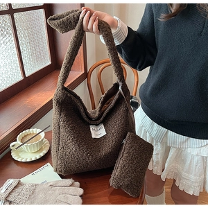 Detail of coffee brown fuzzy tote bag with textured fleece and small matching coin purse