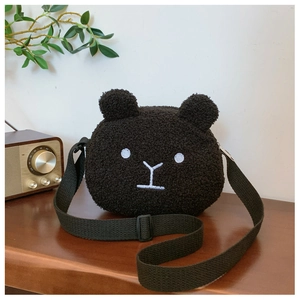 Chic black plush bear-shaped crossbody bag with a soft fleece texture and green strap