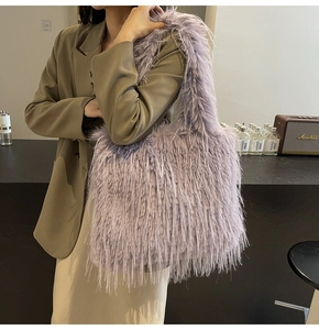 Macro detail of lavender faux fur tote bag showing the soft plush texture and large capacity