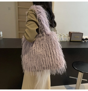 Detail of lavender fuzzy faux fur tote bag showing the fluffy texture and large capacity