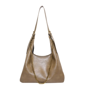 Chic autumn PU leather shoulder bag in vintage brown with a decorative gold chain