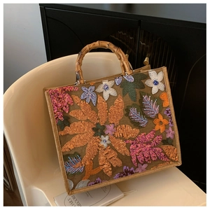 Linen tote bag with sequin floral embroidery and natural bamboo handles for women