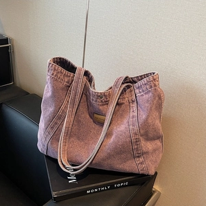 Chic washed purple denim tote bag with vintage texture and spacious shoulder design