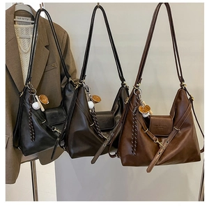 Retro large capacity crescent shoulder bags in black and brown glossy finish
