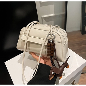 Minimalist beige PU leather Boston shoulder bag with cute dachshund and chocolate charms