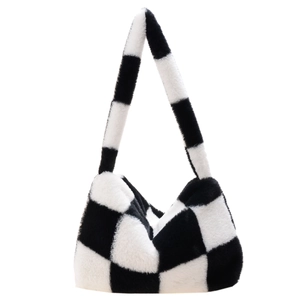 Minimalist black and white checkerboard faux fur handbag with plush shoulder strap design