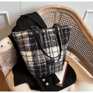 Fashionable black and white plaid plush tote bag with black leather handles for autumn