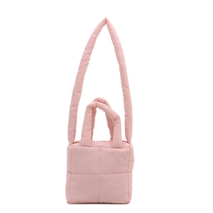 Chic pink quilted puffer tote bag with soft padded straps for versatile daily shoulder wear