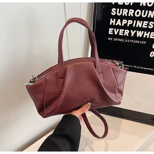 Minimalist burgundy PU leather crossbody bag with pleated design and top handle