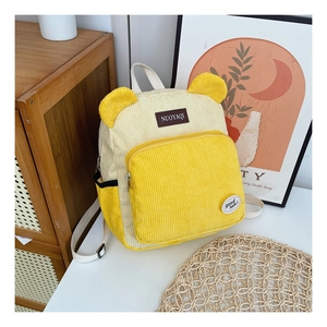 Corduroy bear-shaped children backpack in yellow and cream with adjustable straps