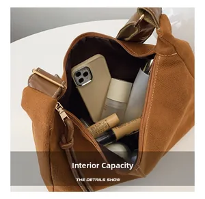 Internal capacity of the vintage brown canvas tote bag showing daily essentials