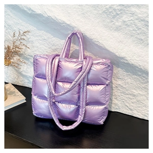 Quilted lavender puffer tote bag with metallic finish and dual handles for women